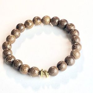 Women’s brown and gold bracelet